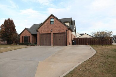 View of front of home featuring a garage and a fro