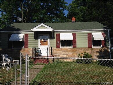 Exterior Front. Stone with Aluminum Siding. Roof w