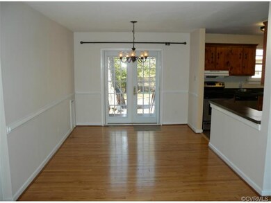 Large Dining Room with French doors that open to t