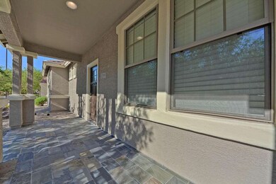 Tiled, shaded front porch