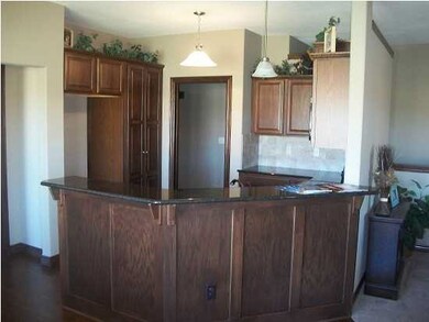 Kitchen view, walk in pantry and walk in laundry.
