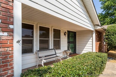 Covered front porch to sit and enjoy the fresh air