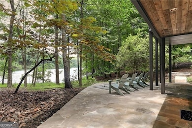 Serene View of Lake Petit from the Flagston Patio