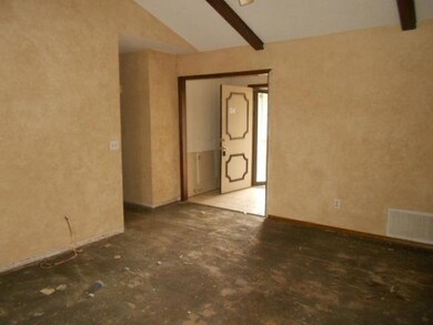 Living Room. This view shows vaulted ceiling and n