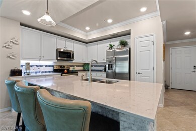 Modern style white cabinets with crown molding and
