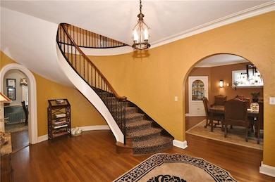 Gleaming hardwood floors and floating staircase.