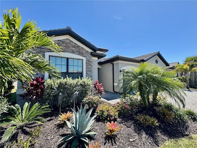 View of front of home featuring stucco siding and