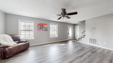 Natural light streams in from all sides of the home. The outdoor landscape provides for full sun and a partial privacy tree line.
