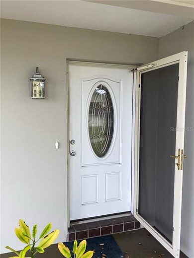 Attractive entryway with new steel door and screen