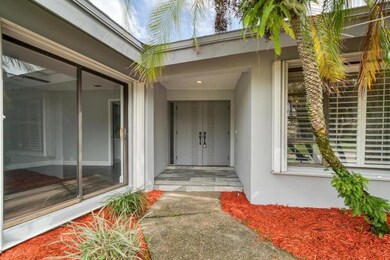 Front entrance with french doors and sliders to office(front bedroom)