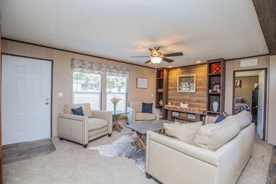 Upon entry at front door, the sitting area is larg