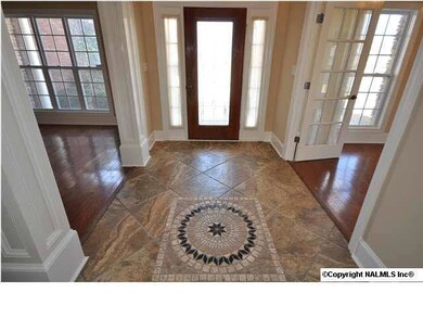 VIEW OF THE STUNNING DETAIL DISPLAYED IN THE TILE FLOOR