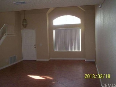 LIVING ROOM AND FRONT DOOR FROM DINING AREA.VERY N