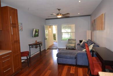 Living area featuring recessed lighting, baseboar