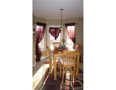 Kitchen. The sun-drenched breakfast area is bumped
