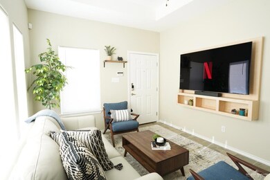 Living room featuring baseboards