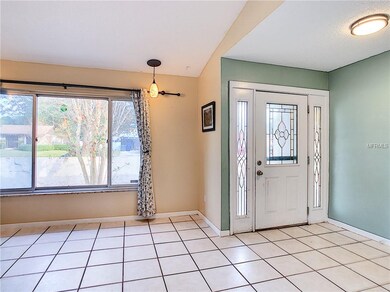 Spacious foyer entry leads directly to the formal 
