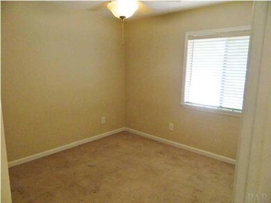 Bedroom is large with great lighting