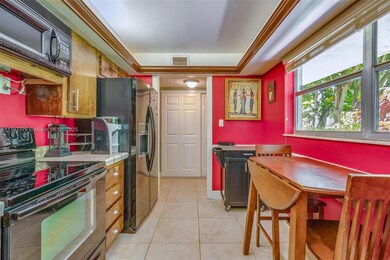 Kitchen walls are painted white.