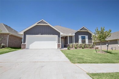 View of front of home featuring a garage and a fro