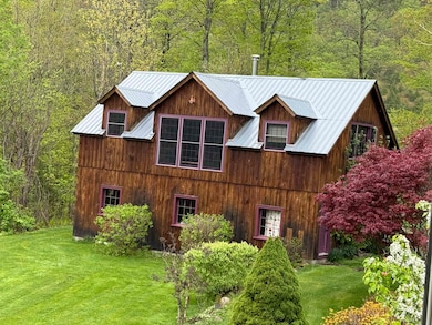Barn: 2 car garage and office/studio space above!