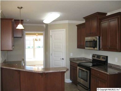 KITCHEN WITH MAPLE CABINETS, TILE FLOORING, LARGE PANTRY, & MORE!