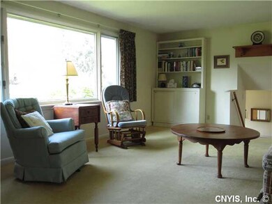 Living Room. View from the fireplace - built-ins f