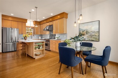 Notice the gorgeous and well-maintained bamboo floors that grace the entire main level and the primary bedroom upstairs.