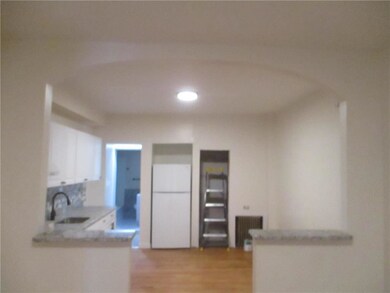 Apt #1 full view of eat in kitchen