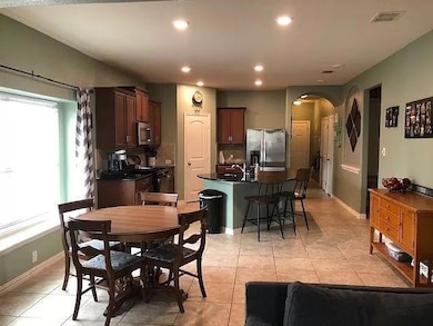Dining room with arched walkways, healthy amount 