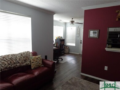 Living area looking into Sunroom