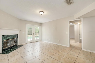 Formal Living Room toward the Pool and Kitchen