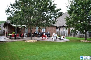 YOU WILL LOVE THE SIZE OF THIS FENCED BACK YARD AN