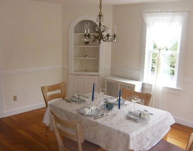 Dining Room. Formal dining room with wide pine flo