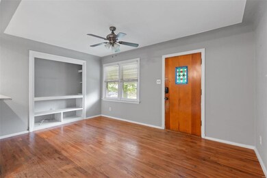 Note the built-in area for your big screen and shelves for collections or books.  