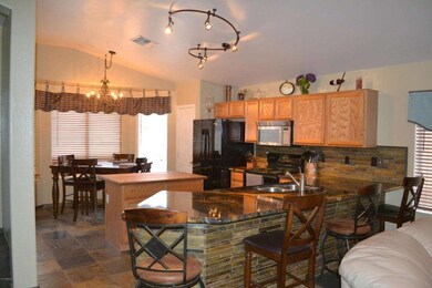 SPACIOUS KITCHEN OPENS TO GREAT ROOM