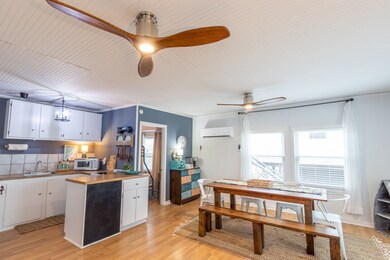  Bright, open-concept kitchen and dining area. The