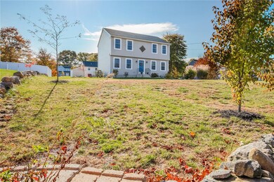 Low maintenance vinyl siding and landscaping.