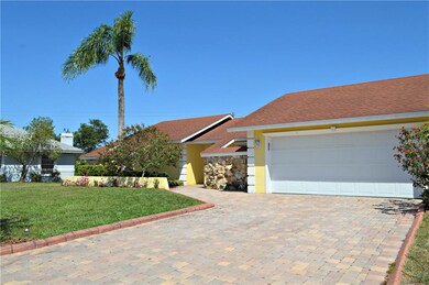 Newer paver driveway with custom curbing