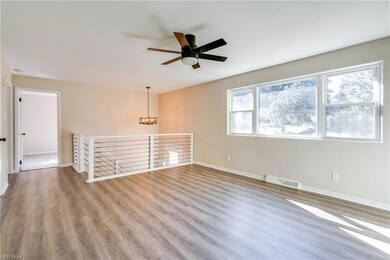Unfurnished room with plenty of natural light, lig