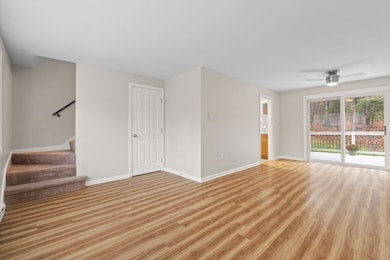 The Spacious Open Floor Plan Features Sliders To A Private Deck