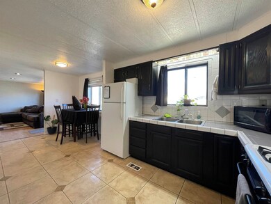 Kitchen to dining and living