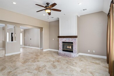 Living area features a fireplace