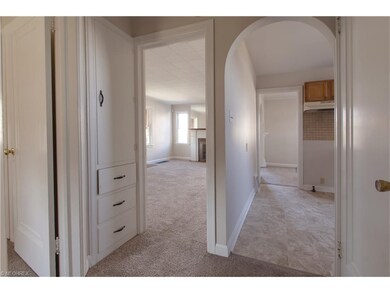 Hall looking into kitchen and living room