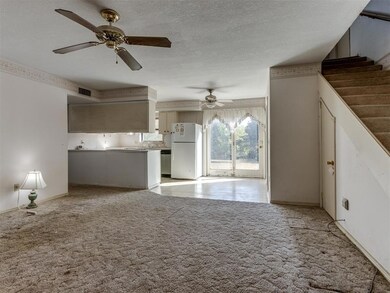 Front living room that opens to dining room