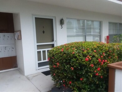 Front Entrance next to Mail Boxes and Storage/Laun