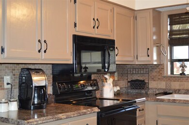 New countertops, new backsplash, new fixtures!