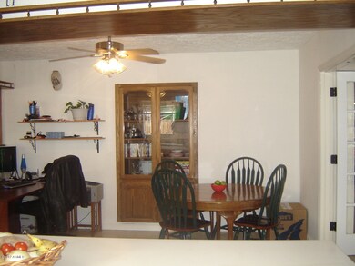 Dining area with built in cabinet.