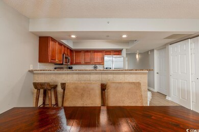 Kitchen featuring appliances with stainless steel 