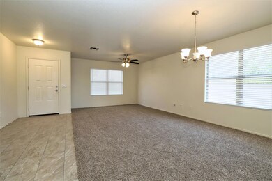 Tiled front entry & living/dining
